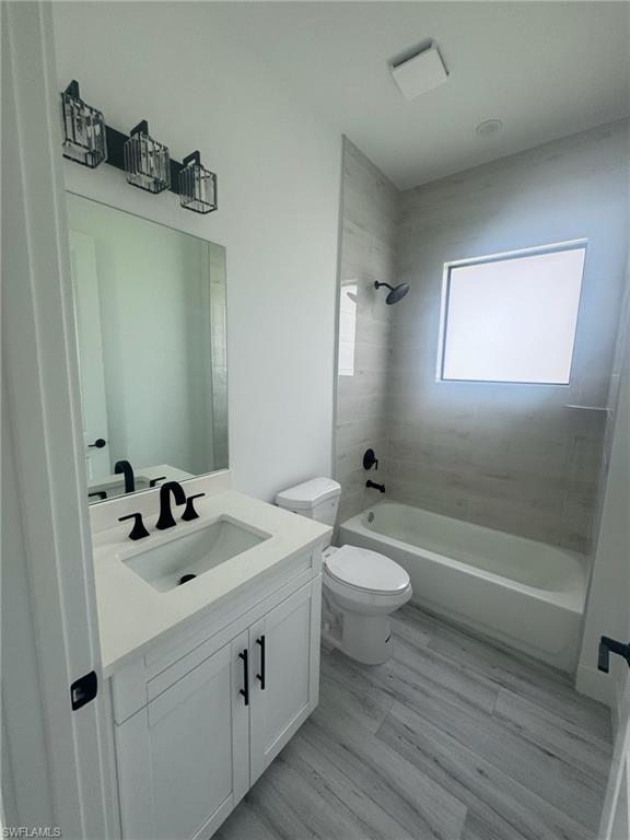308 Golden Gate Boulevard East Naples, FL 34117 - Photo 24 of 29 a bathroom with a sink a toilet and shower