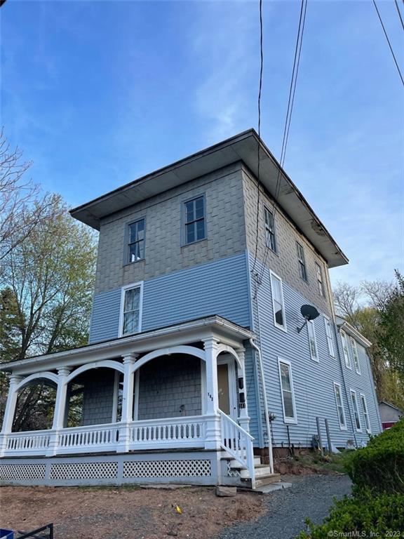 141 Spring Street Middletown, CT 06457 - Photo 1 of 1 a front view of a house with garage
