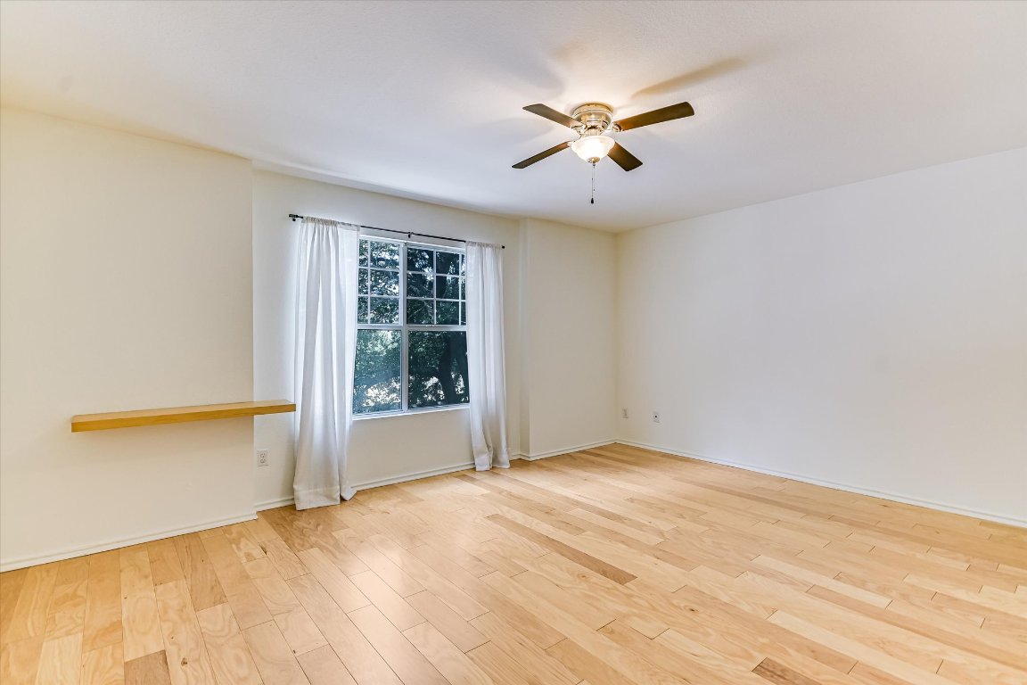1193 Curve Street Austin, TX 78702 - Photo 9 of 18 a view of an empty room with a window