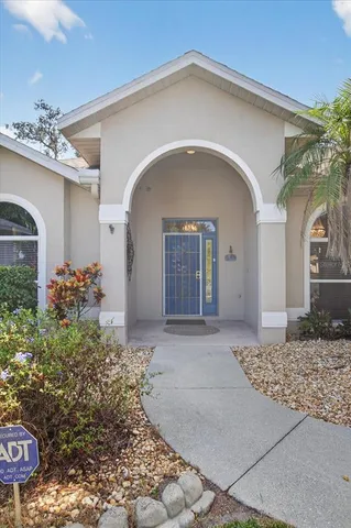 a view of an empty room with glass door