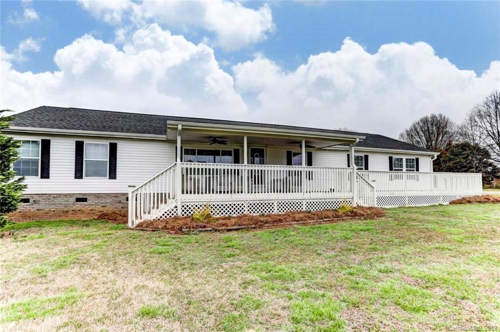 4737 White Store Road Wingate, NC 28174 - Photo 2 of 36 a front view of a house with a yard