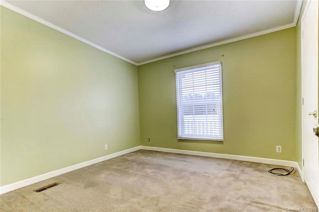 4737 White Store Road Wingate, NC 28174 - Photo 18 of 36 a view of an empty room with a window
