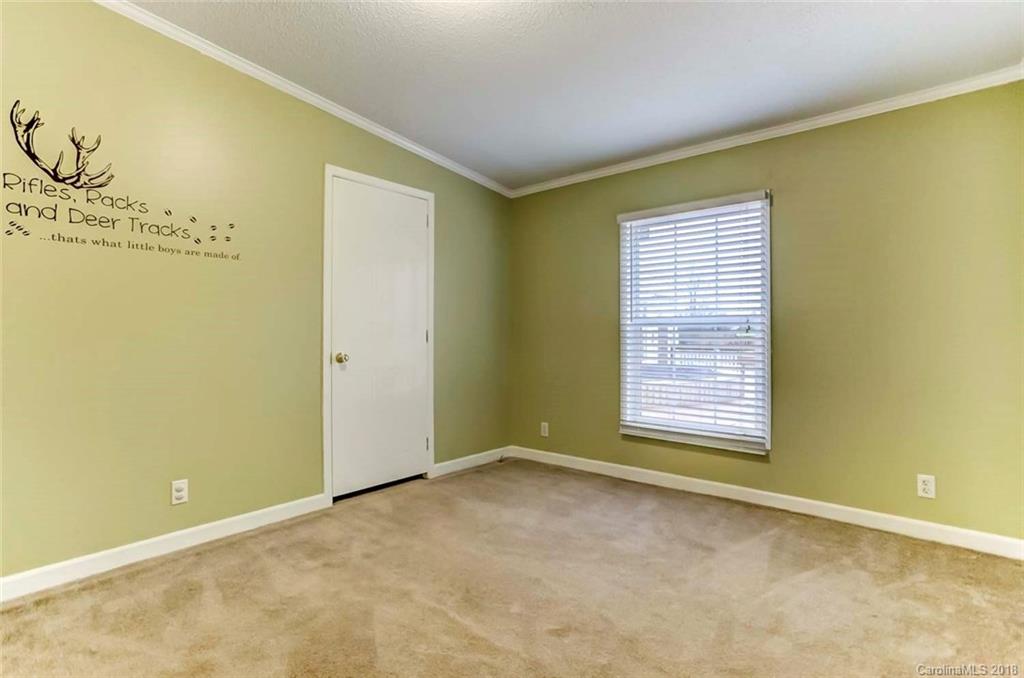 4737 White Store Road Wingate, NC 28174 - Photo 19 of 36 a view of an empty room with a window