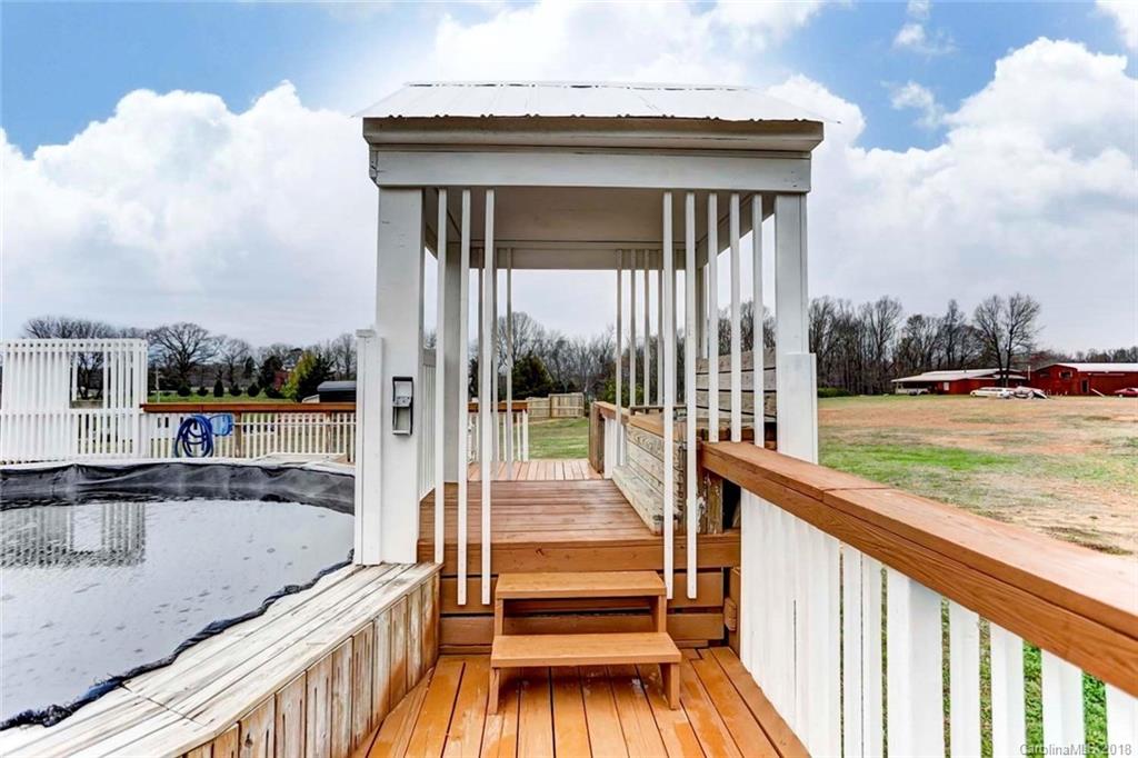 4737 White Store Road Wingate, NC 28174 - Photo 30 of 36 a view of a balcony with yard