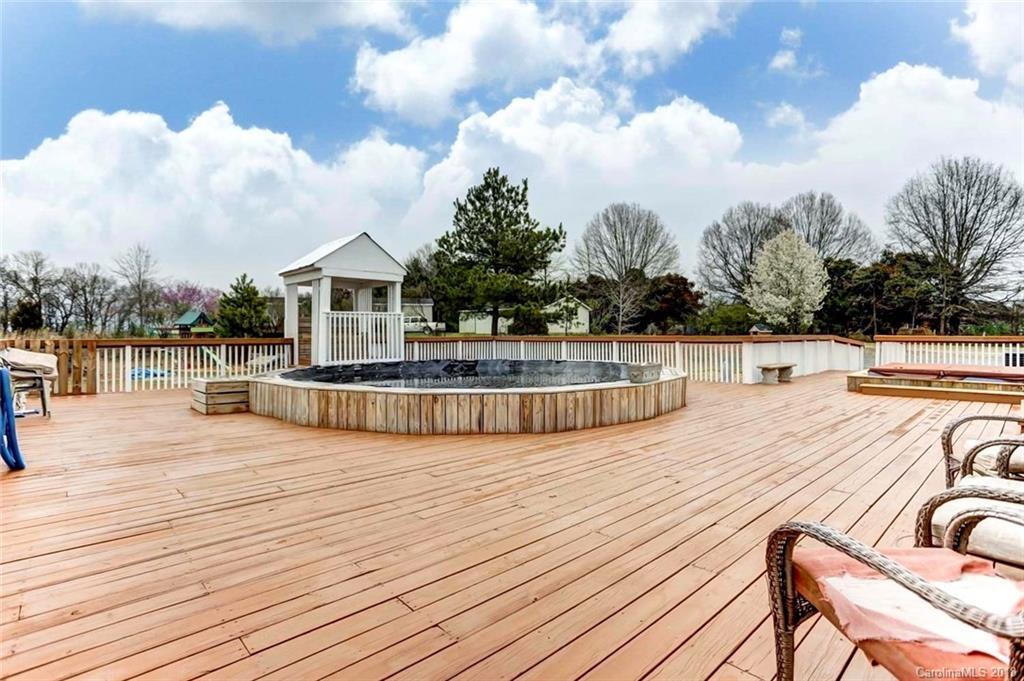 4737 White Store Road Wingate, NC 28174 - Photo 33 of 36 a view of a house with pool and sitting area