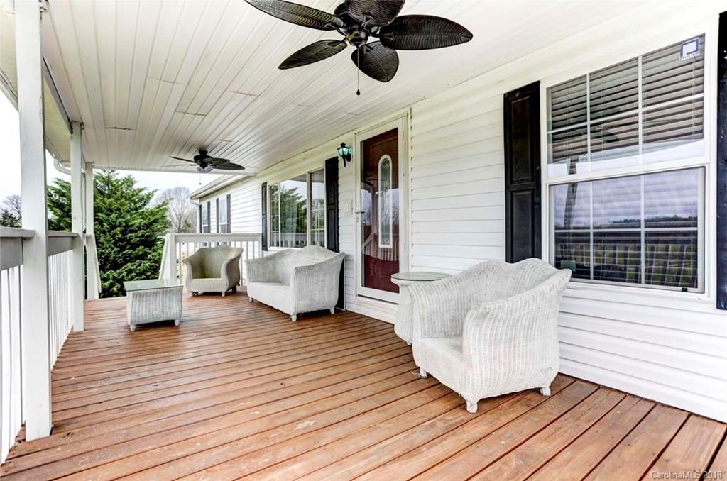 4737 White Store Road Wingate, NC 28174 - Photo 5 of 36 a living room with furniture and a large window
