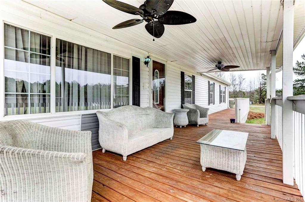 4737 White Store Road Wingate, NC 28174 - Photo 6 of 36 a living room with furniture and a large window