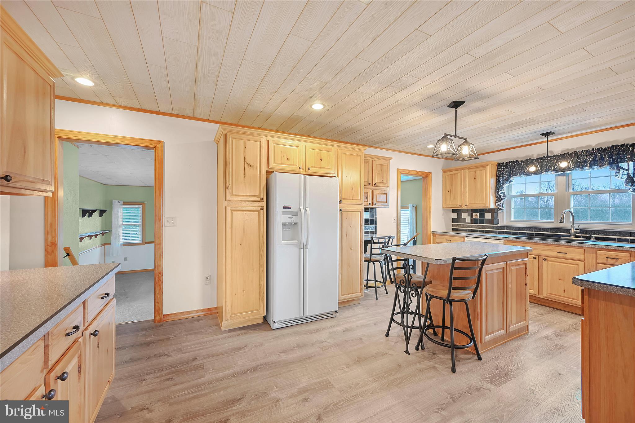 3 Coleman Road Hegins, PA 17938 - Photo 22 of 52 a dining hall with stainless steel appliances granite countertop a sink and a refrigerator