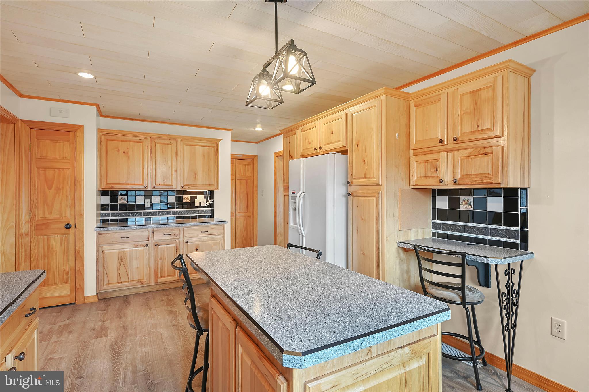 3 Coleman Road Hegins, PA 17938 - Photo 23 of 52 a kitchen with stainless steel appliances granite countertop a stove refrigerator and cabinets