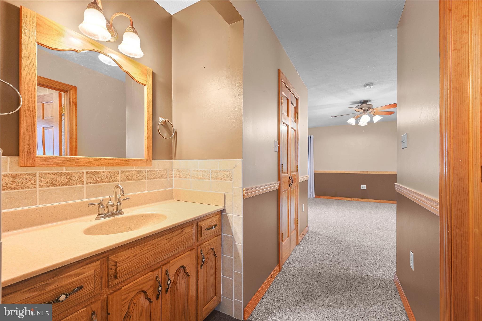 3 Coleman Road Hegins, PA 17938 - Photo 33 of 52 a en suite bathroom with a sink double vanity and a mirror