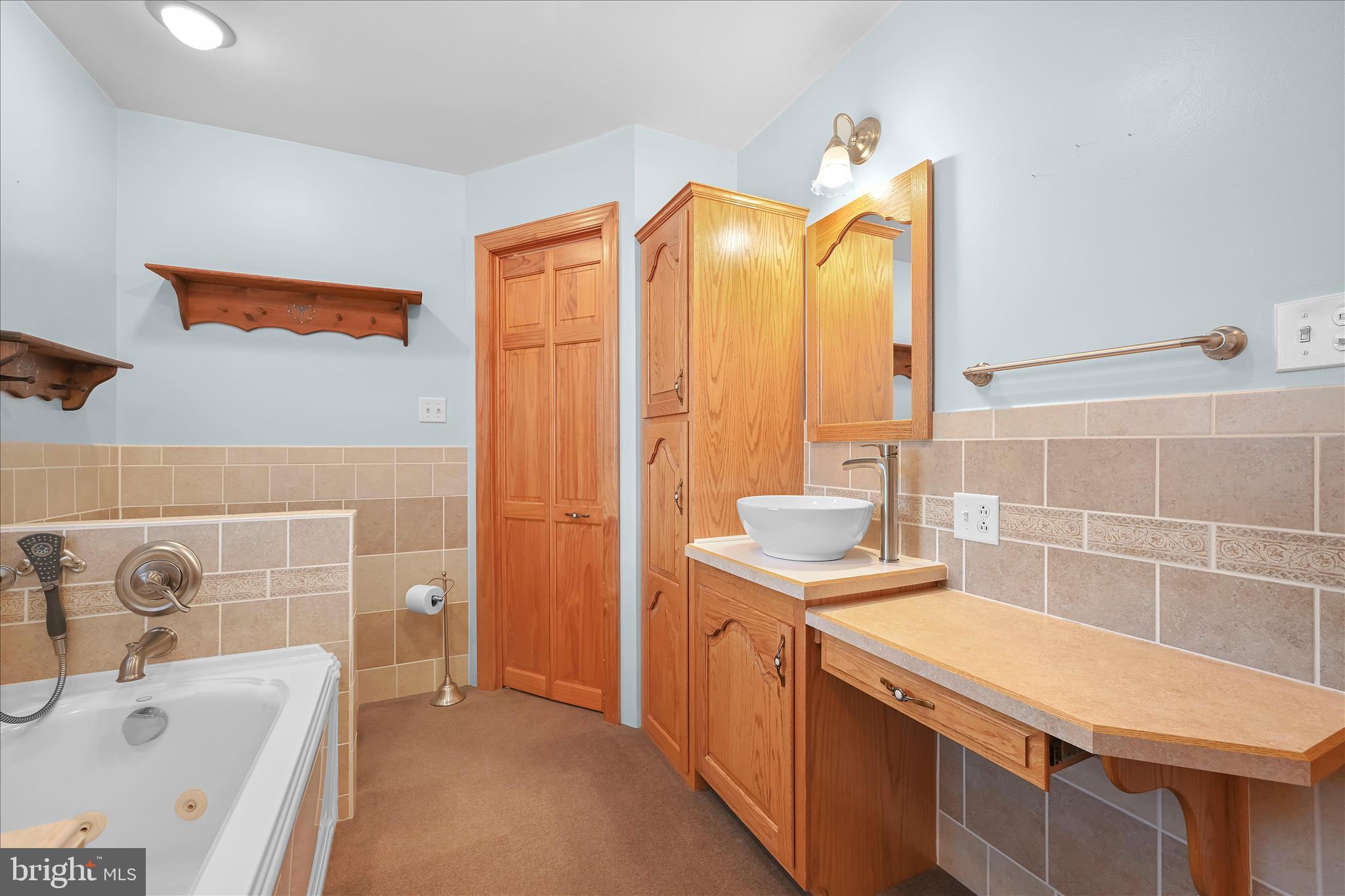 3 Coleman Road Hegins, PA 17938 - Photo 35 of 52 a bathroom with a tub sink and mirror