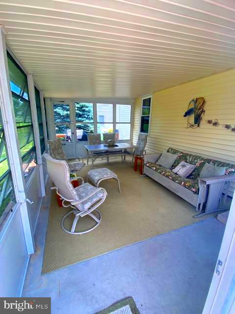 1303 Woodmere Road Pottstown, PA 19464 - Photo 32 of 38 Enclosed Porch