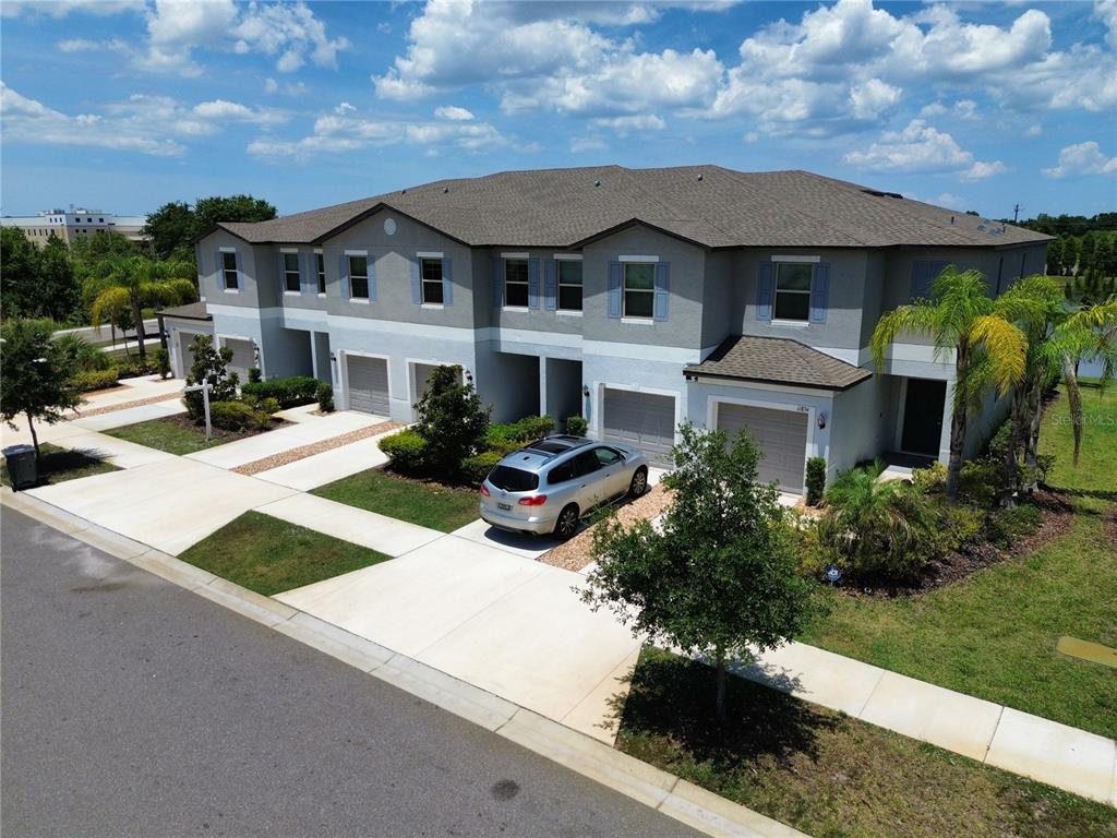 11826 Dumaine Valley Road Riverview, FL 33579 - Photo 5 of 54 a front view of a house with garden