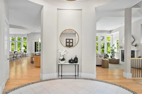 a living room with fireplace furniture and a flat screen tv