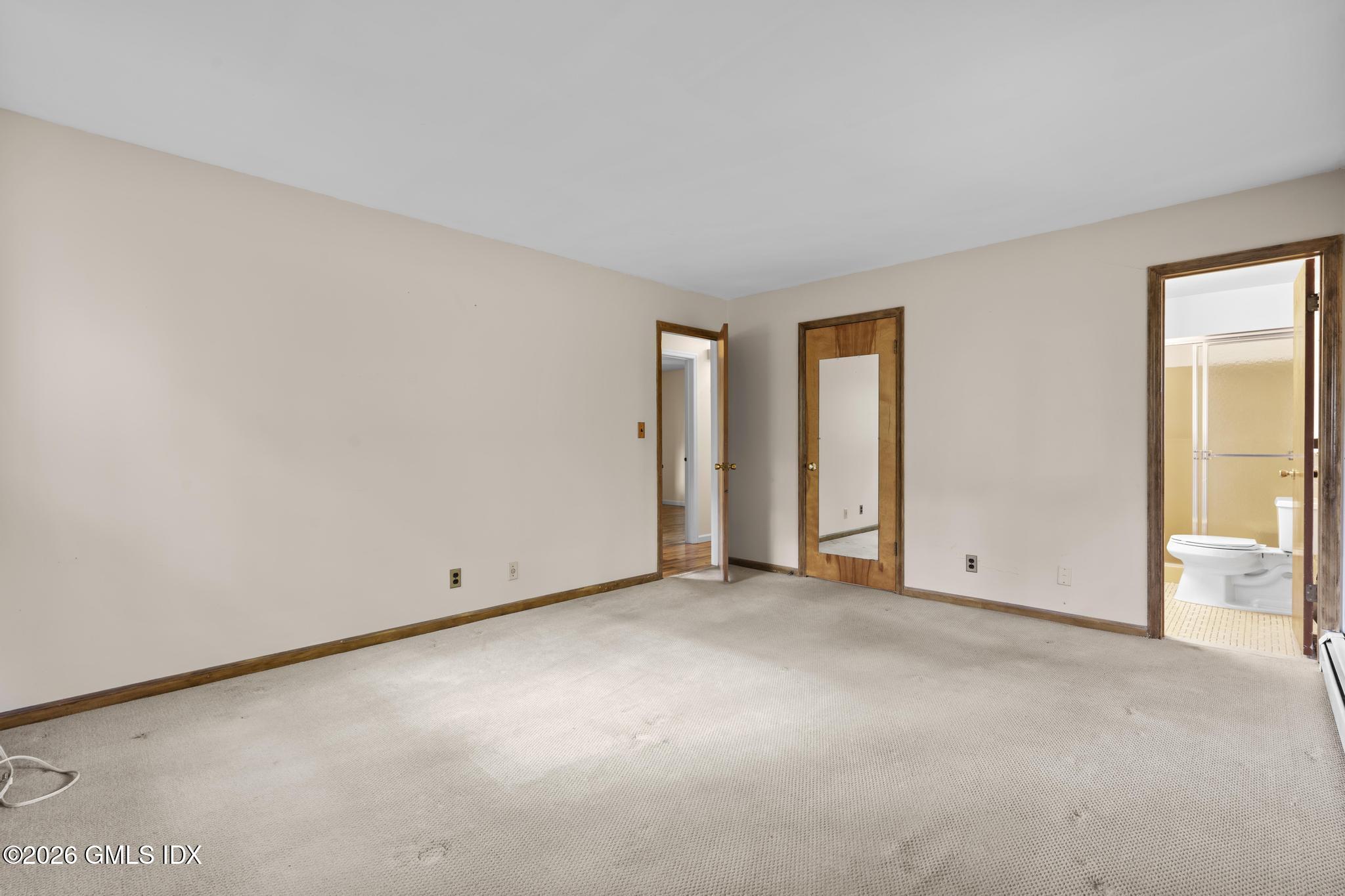 61 Angus Road North, Unit NORTH Greenwich, CT 06831 - Photo 10 of 25 Primary Bedroom