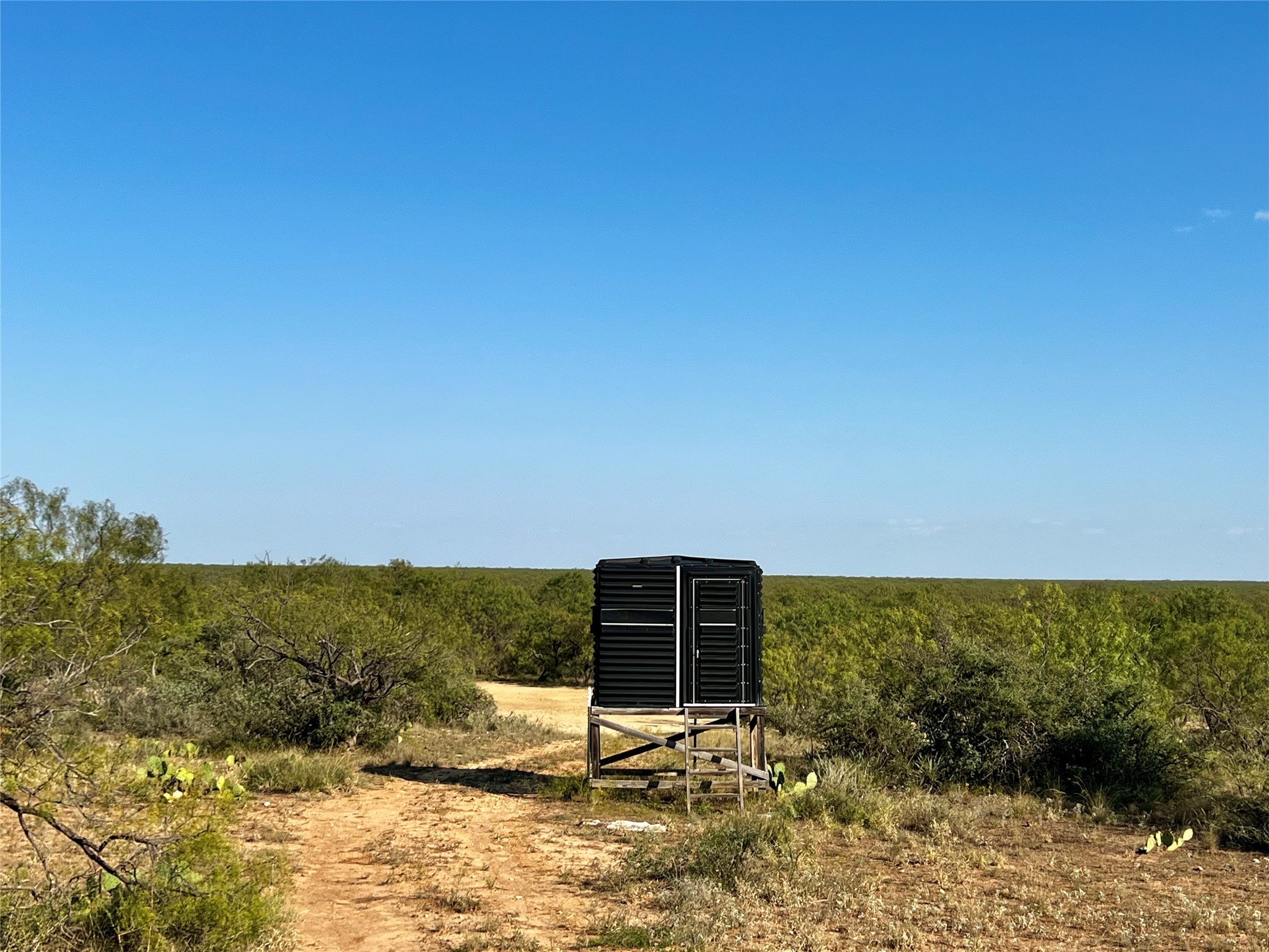332 Rd Lohn Tx 76852 Road Lohn, TX 76852 - Photo 12 of 37 a view of a lake with a mountain