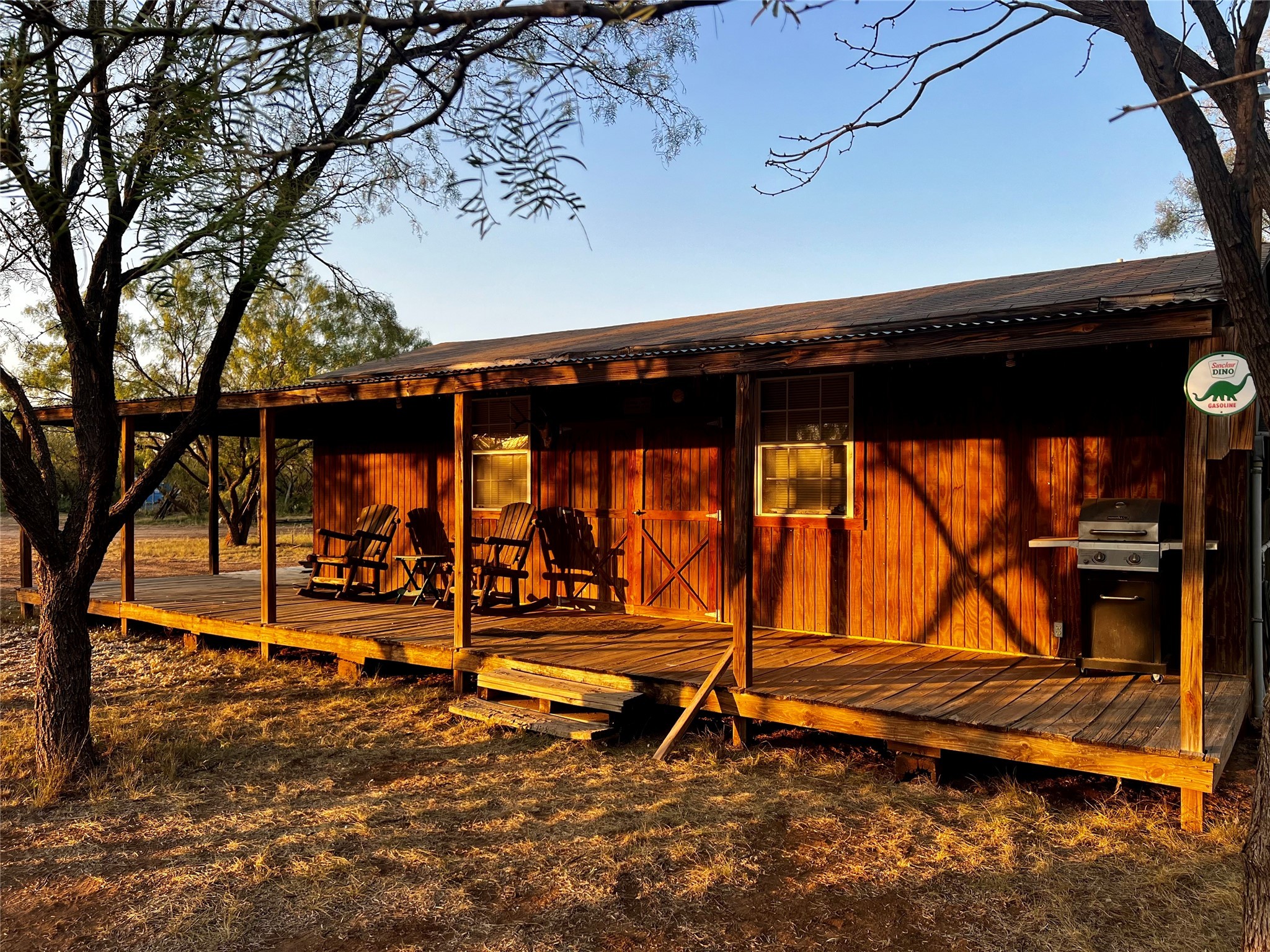 332 Rd Lohn Tx 76852 Road Lohn, TX 76852 - Photo 22 of 37 a backyard of a house with barbeque oven table and chairs