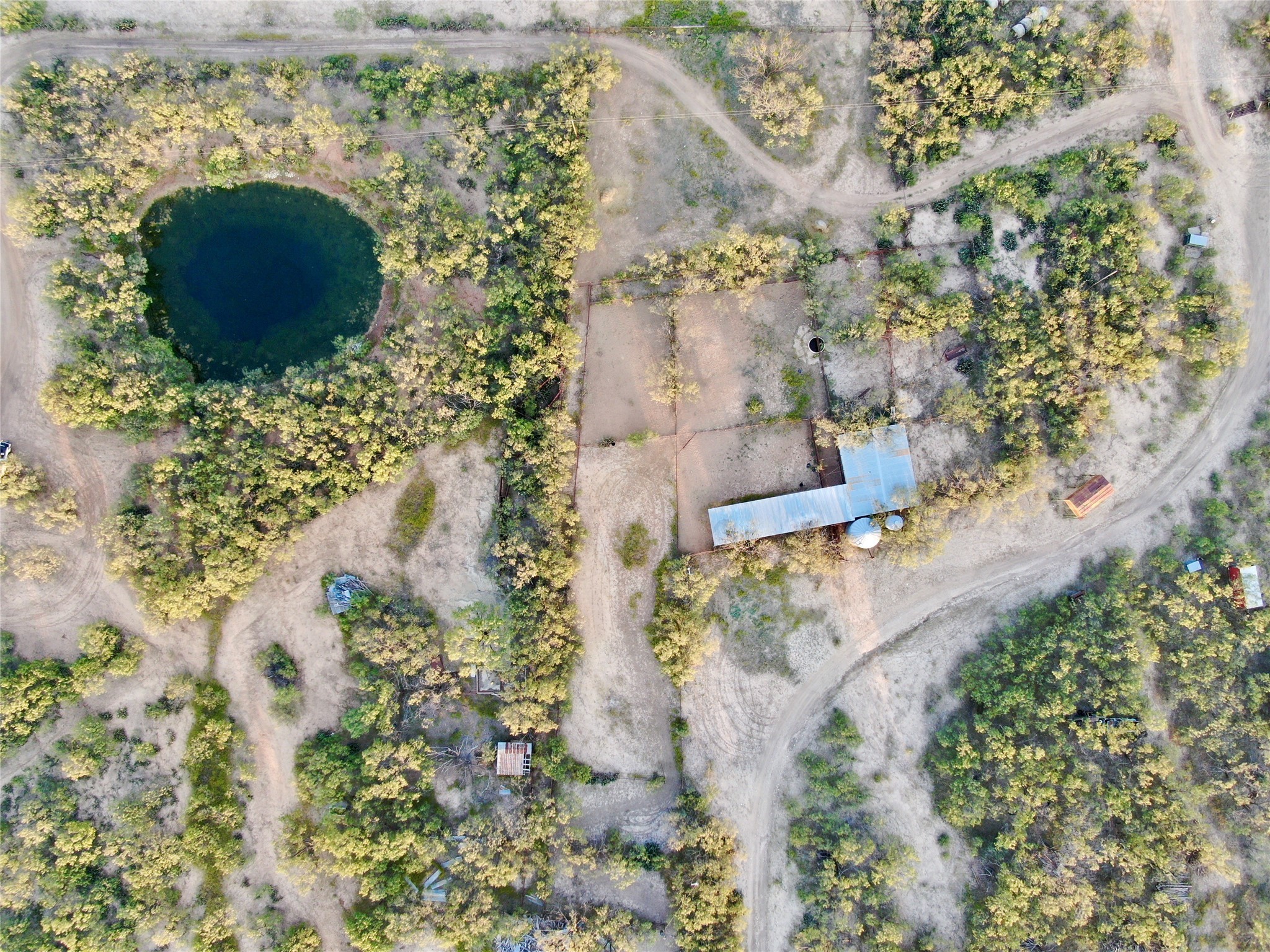 332 Rd Lohn Tx 76852 Road Lohn, TX 76852 - Photo 23 of 37 a aerial view of a house with a yard and trees