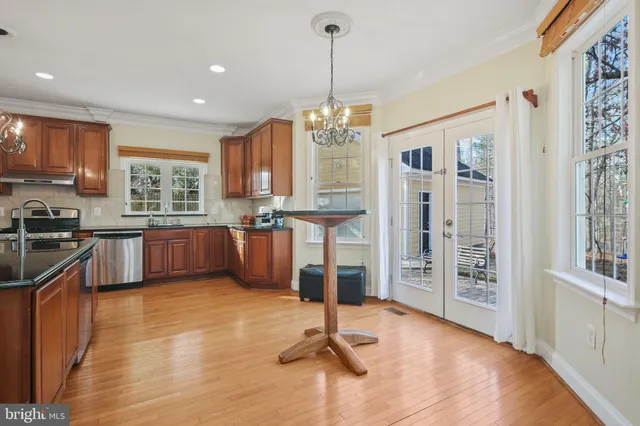 a living room with furniture fireplace and window
