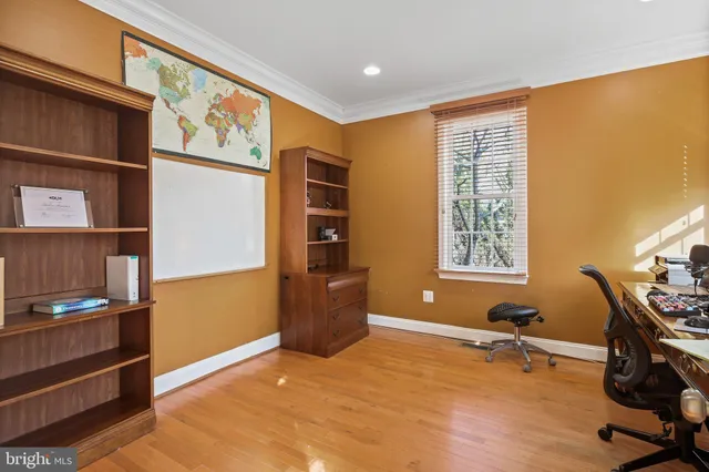 a bathroom with a granite countertop toilet a sink and mirror