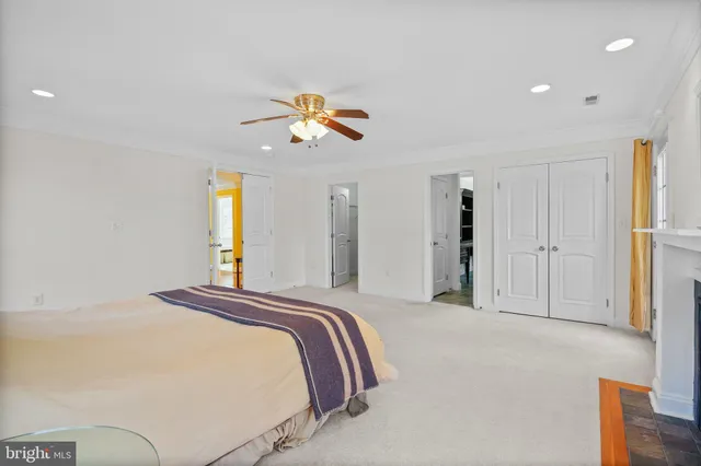 a kitchen with stainless steel appliances granite countertop a sink and a refrigerator