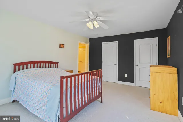 a view of a storage & utility room with dryer and washer