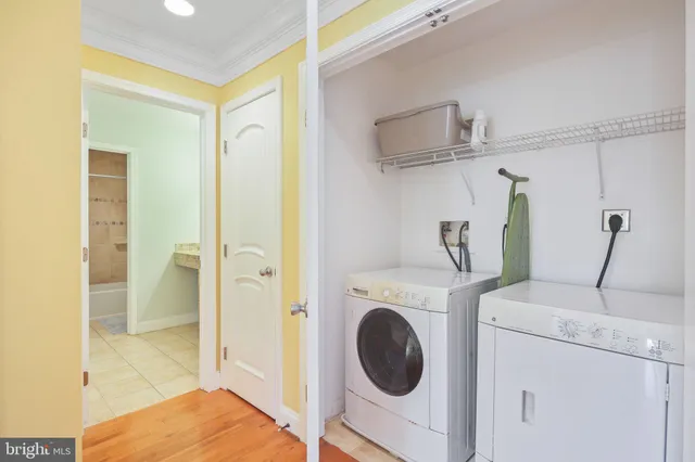 a bathroom with a granite countertop sink a mirror and a shower