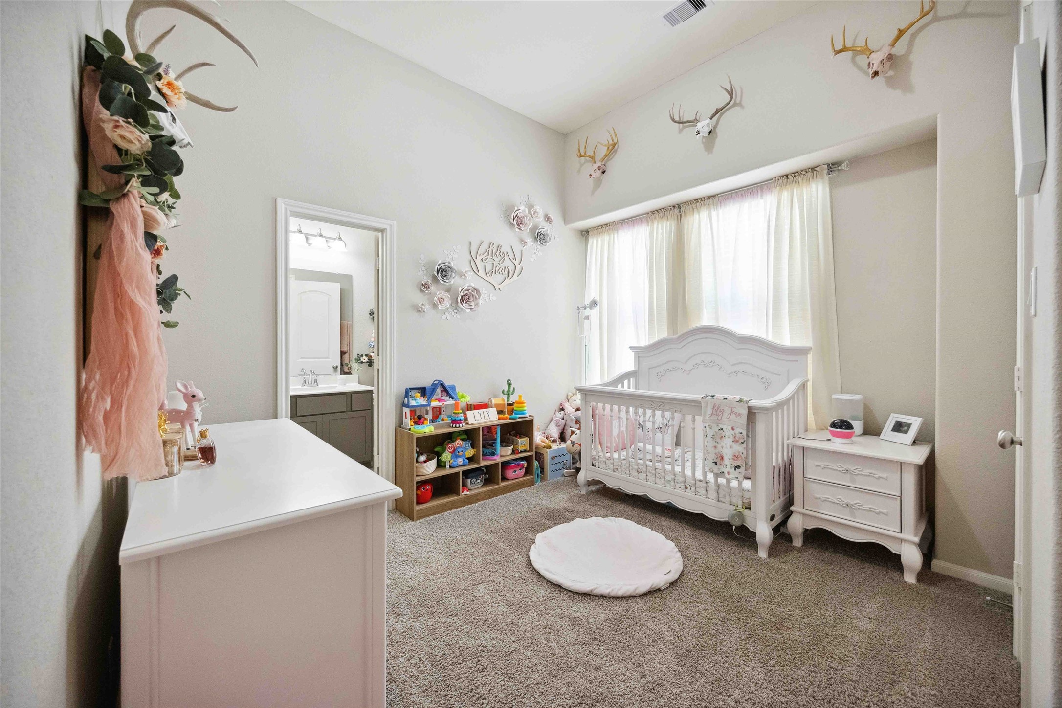 323 Biltmore Loop Montgomery, TX 77316 - Photo 23 of 27 Comfortable third bedroom with neutral finishes.