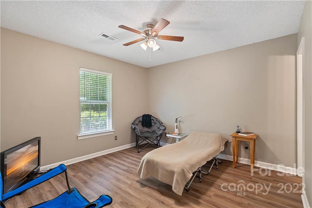225 Creek View Road Mooresville, NC 28117 - Photo 12 of 18 a bedroom with bed and a window