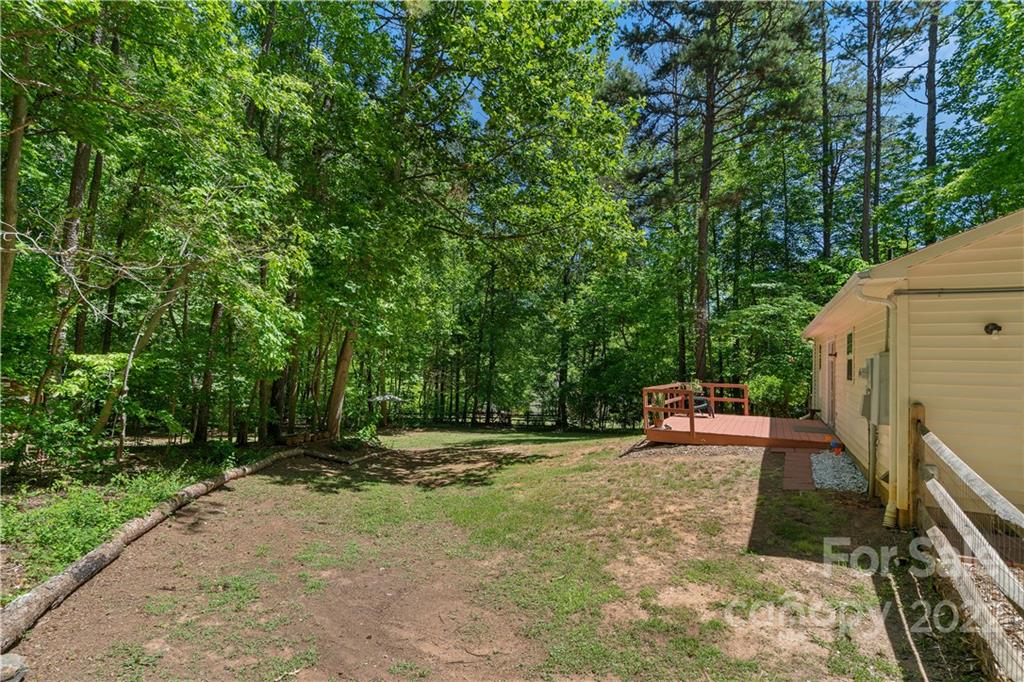 225 Creek View Road Mooresville, NC 28117 - Photo 18 of 18 a view of a backyard with sitting area