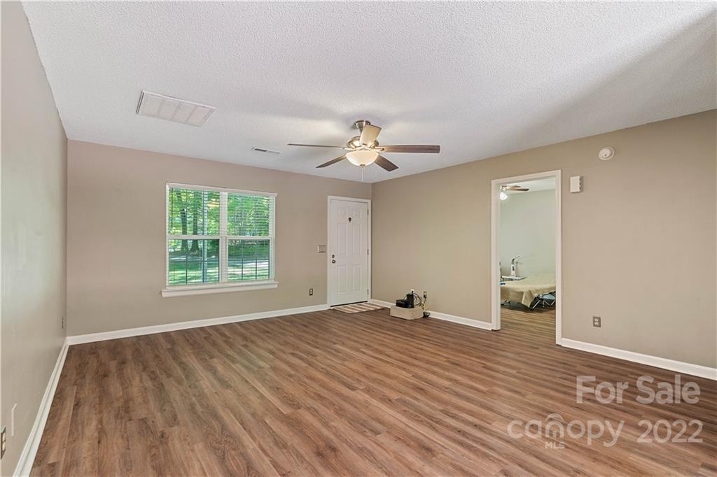 225 Creek View Road Mooresville, NC 28117 - Photo 2 of 18 a view of an empty room with a window