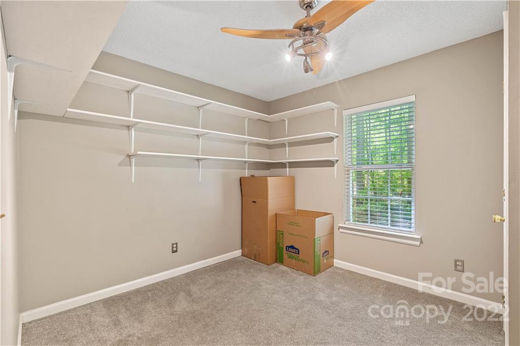 225 Creek View Road Mooresville, NC 28117 - Photo 8 of 18 a view of an empty room with a window