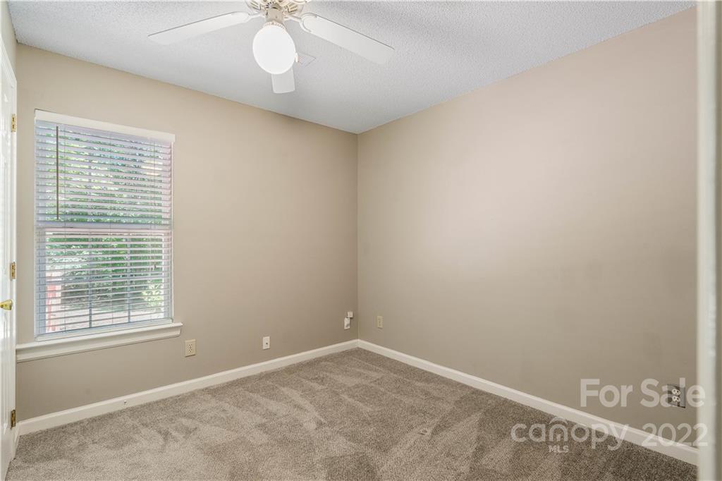 225 Creek View Road Mooresville, NC 28117 - Photo 10 of 18 a view of an empty room with a window