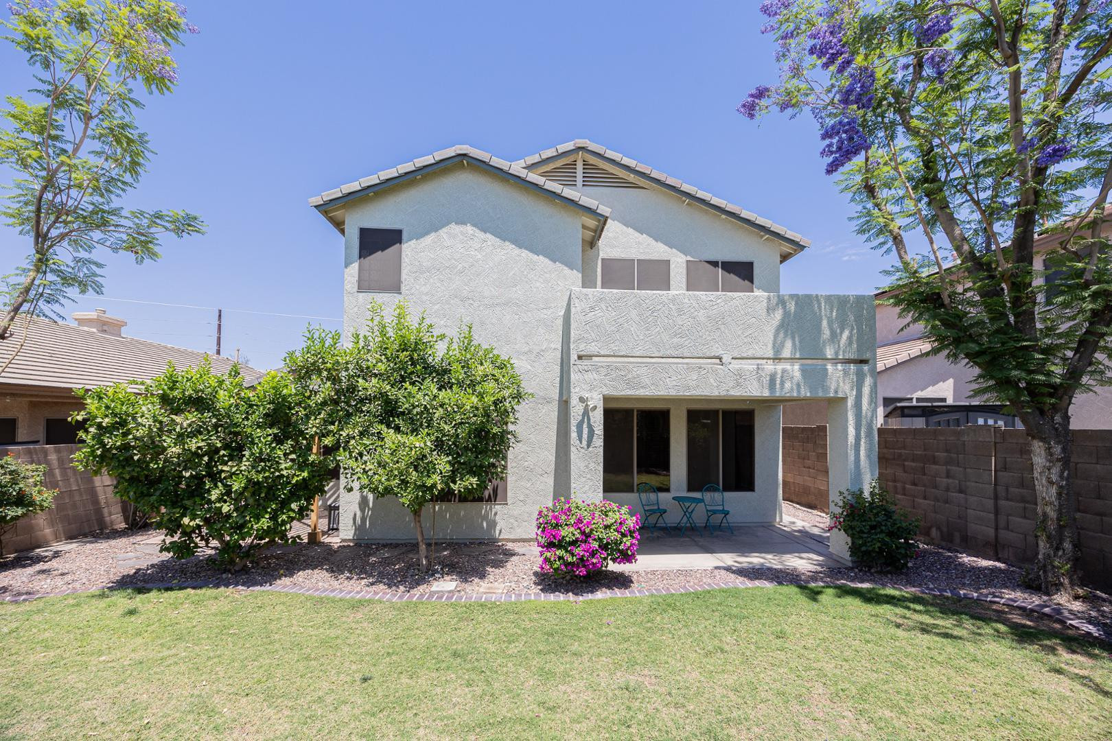 6539 West Jomax Road Phoenix, AZ 85083 - Photo 39 of 39 a front view of a house with a yard and garage