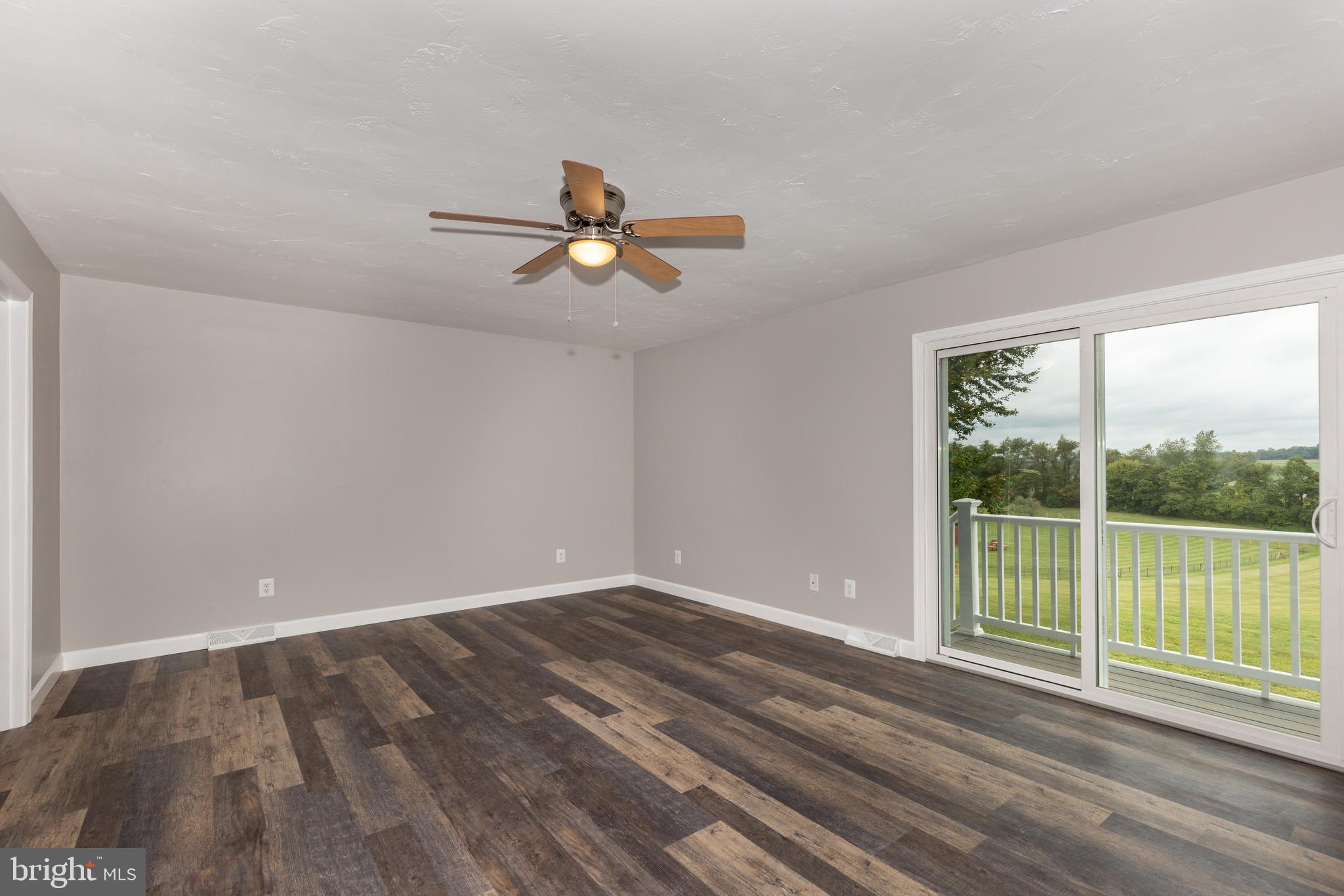 1222 Bachmans Valley Road Westminster, MD 21158 - Photo 31 of 61 Master bedroom with slider to small deck