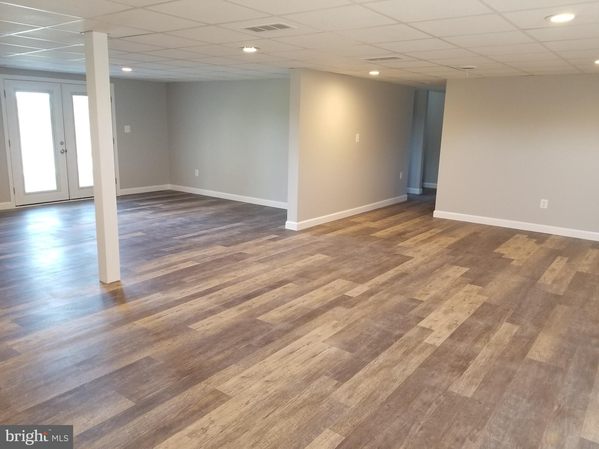 1222 Bachmans Valley Road Westminster, MD 21158 - Photo 45 of 61 Lower level rec room w/ walk out to patio
