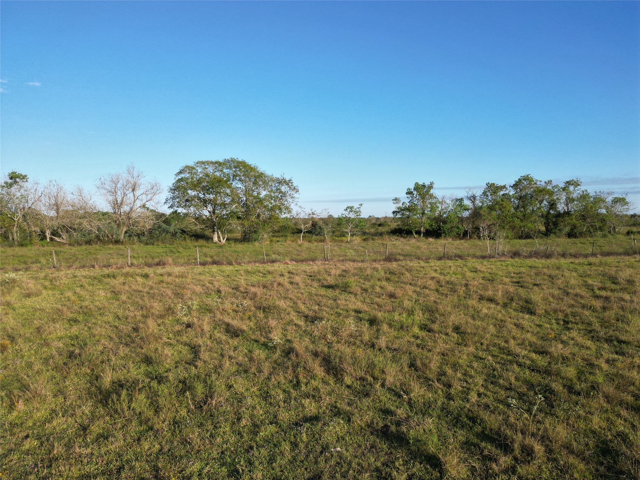 0 County Road 220 Angleton, TX 77515 - Photo 20 of 22 a view of a field with an ocean