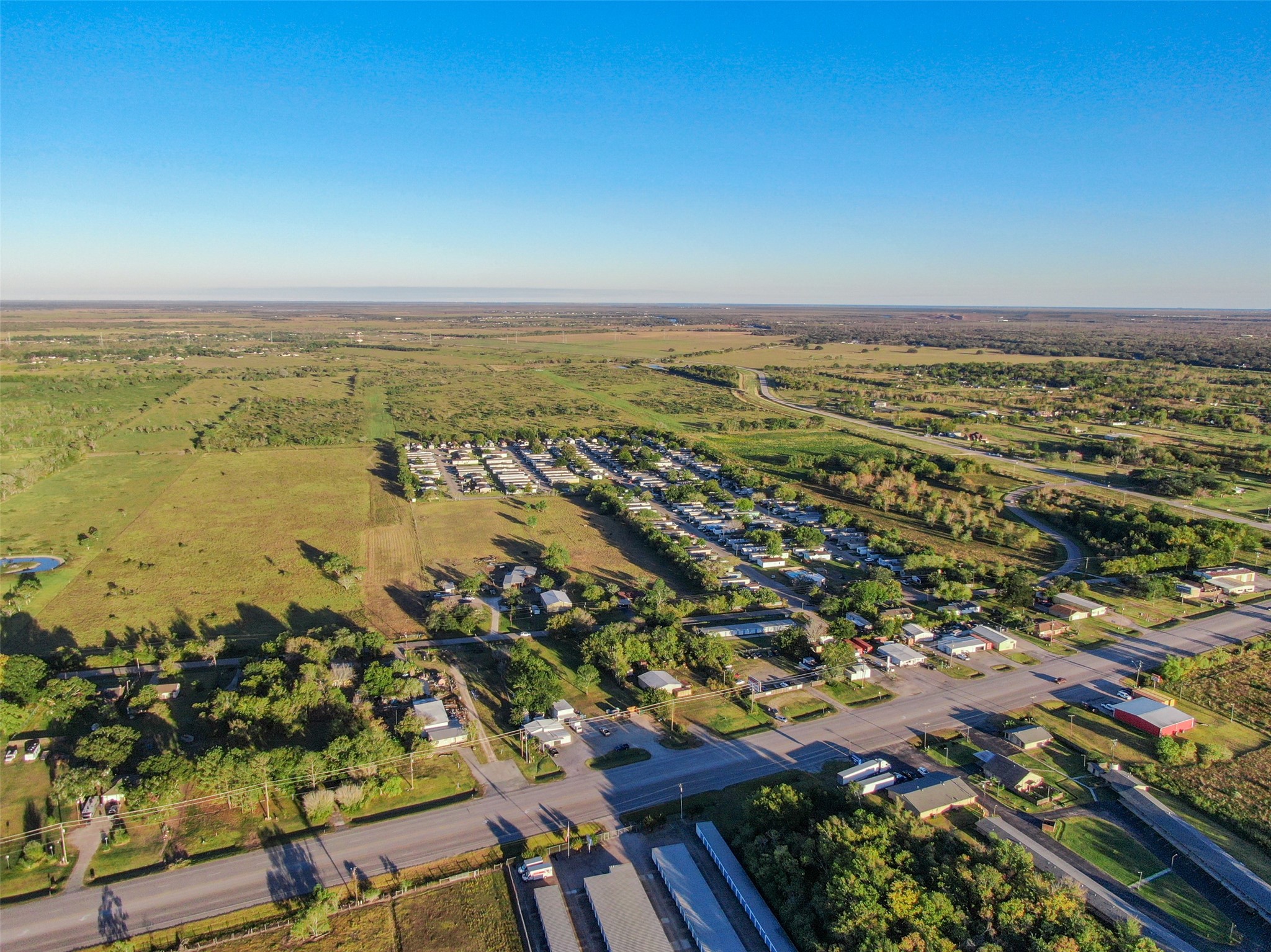 0 County Road 220 Angleton, TX 77515 - Photo 6 of 22 an aerial view of ocean and residential houses with outdoor space