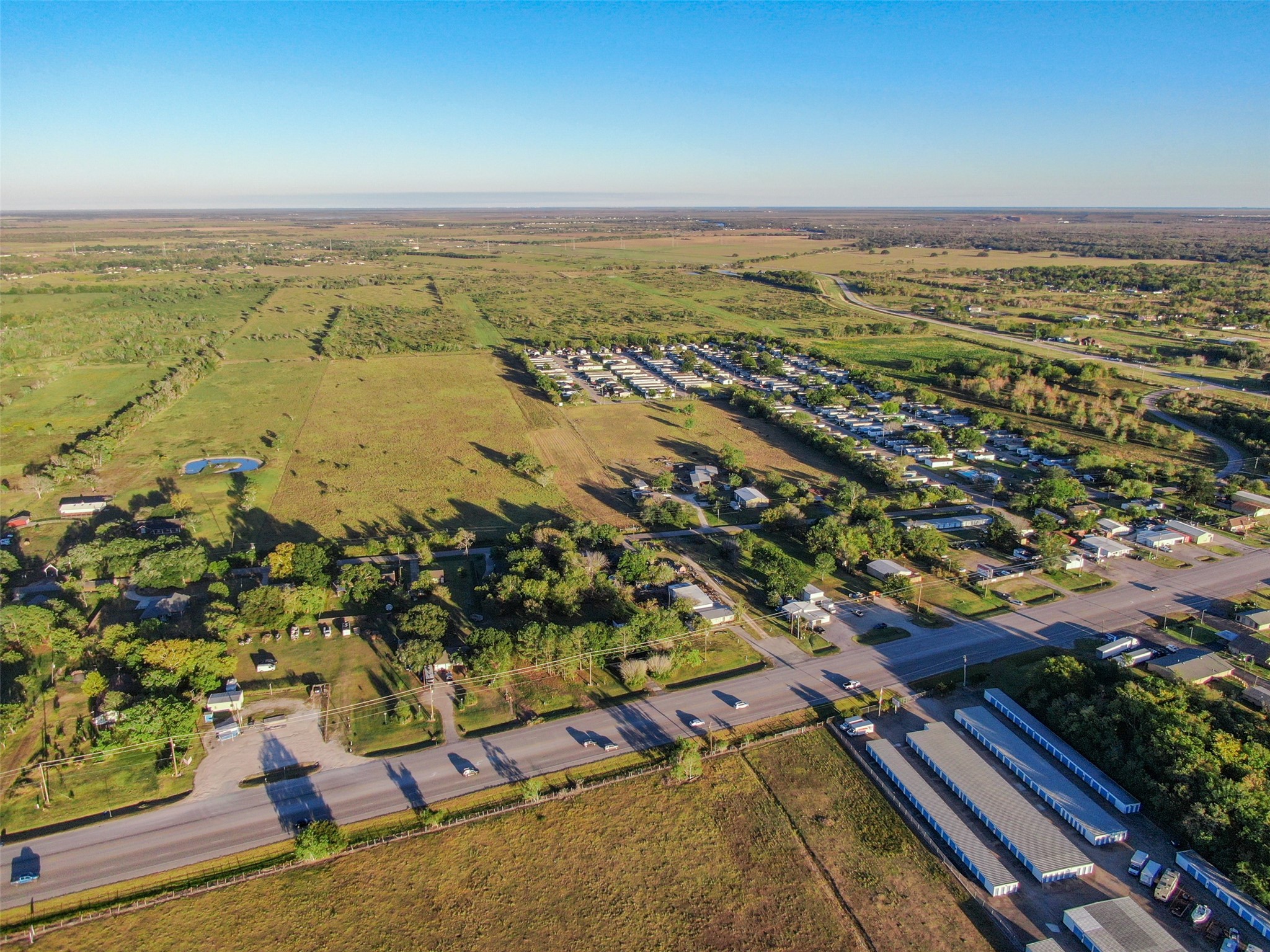 0 County Road 220 Angleton, TX 77515 - Photo 7 of 22 an aerial view of ocean and residential houses with outdoor space
