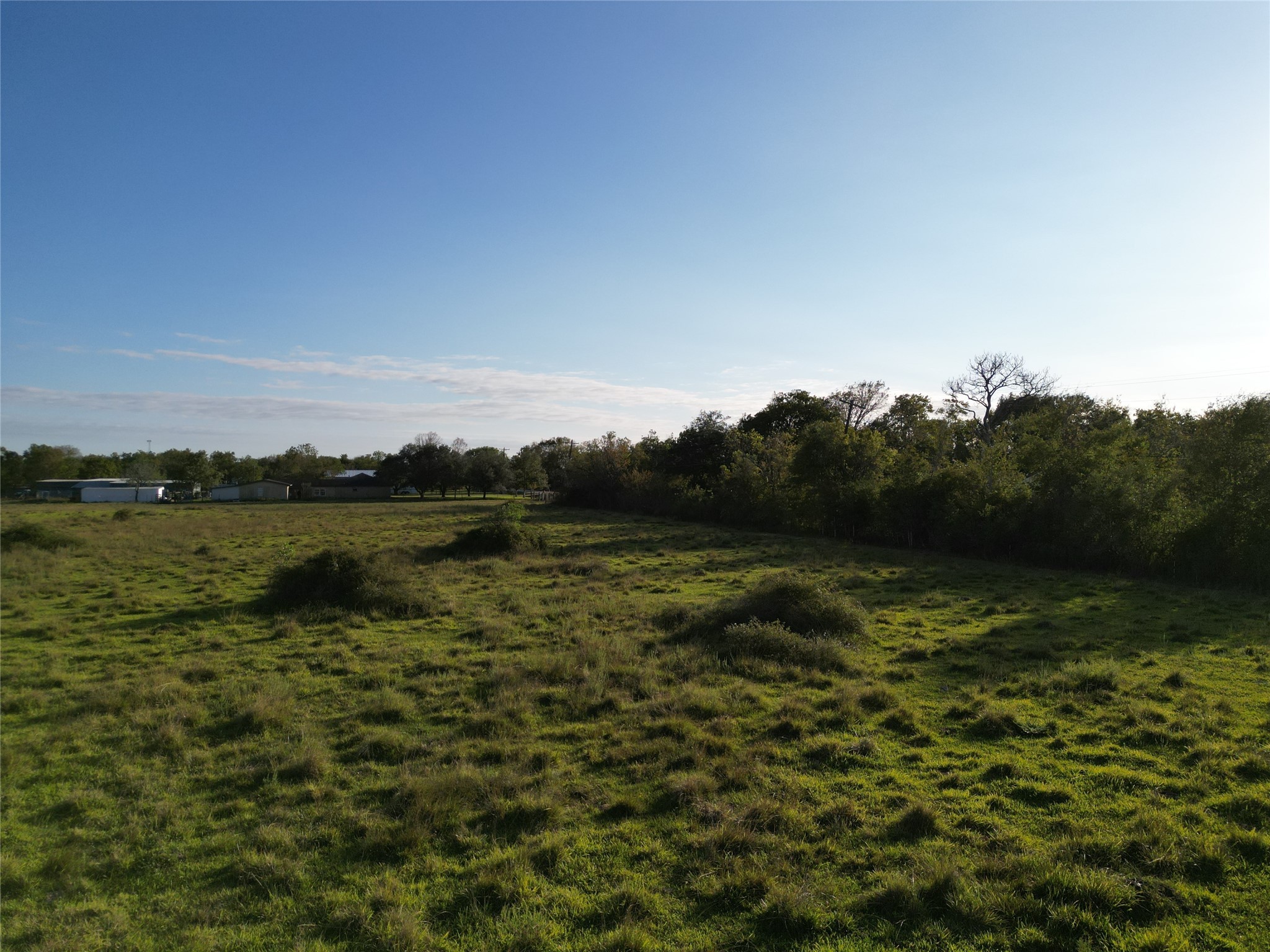 0 County Road 220 Angleton, TX 77515 - Photo 10 of 22 a view of a lake from a yard