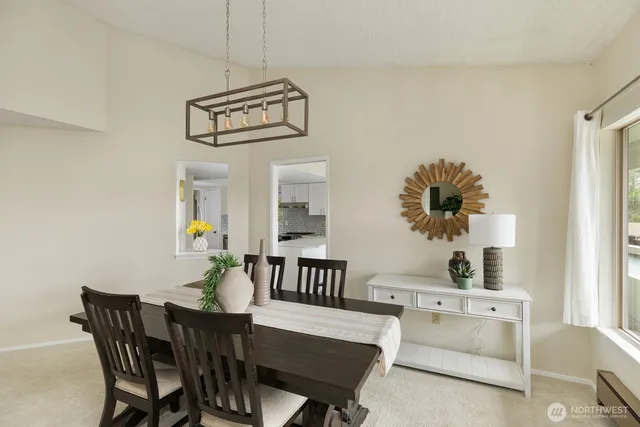 a view of a dining room with furniture