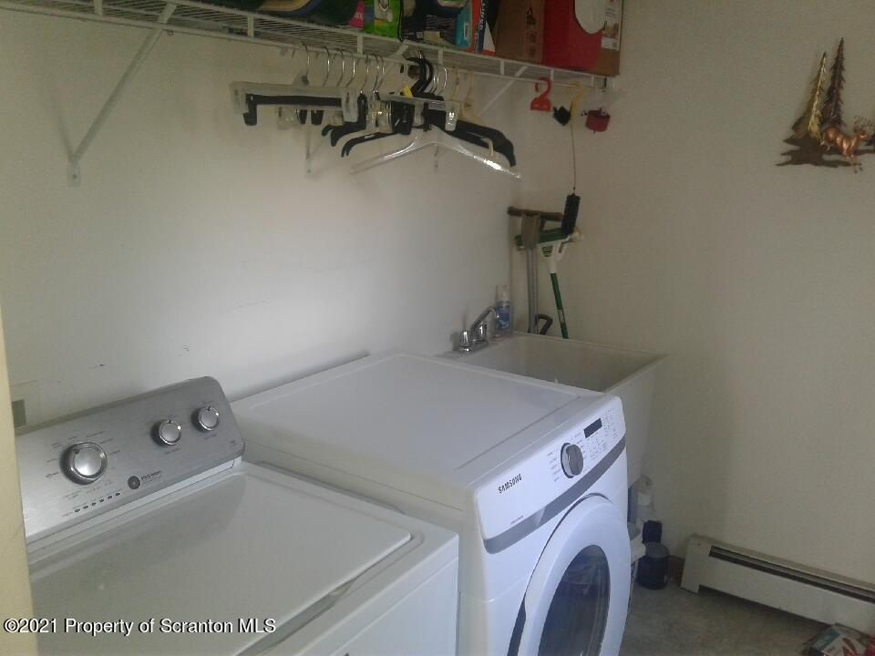 647 Bennett Road Meshoppen, PA 18630 - Photo 29 of 35 a utility room with dryer and washer