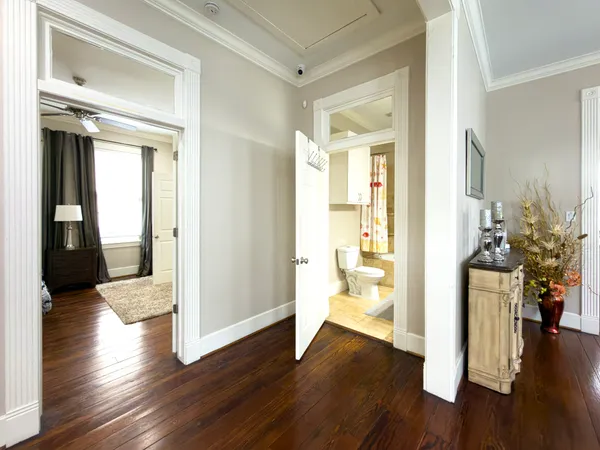 a view of an entryway of the house and wooden floor