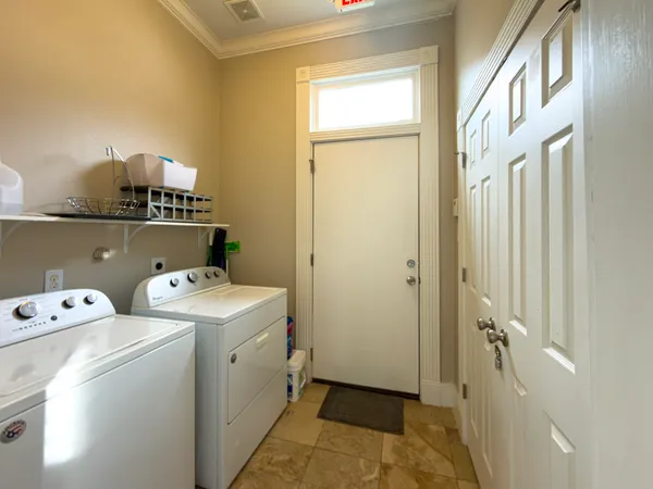 a view of utility room with washer and dryer