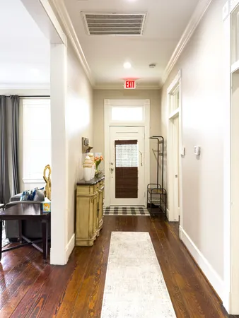 a very nice looking room with wooden floor
