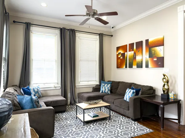 a living room with furniture and a window