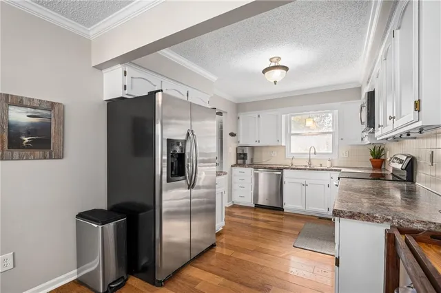 $310,000 | 2120 Southeast 3rd Street, Lee's Summit, MO 64063