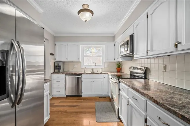 $310,000 | 2120 Southeast 3rd Street, Lee's Summit, MO 64063