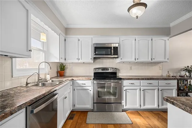 $310,000 | 2120 Southeast 3rd Street, Lee's Summit, MO 64063