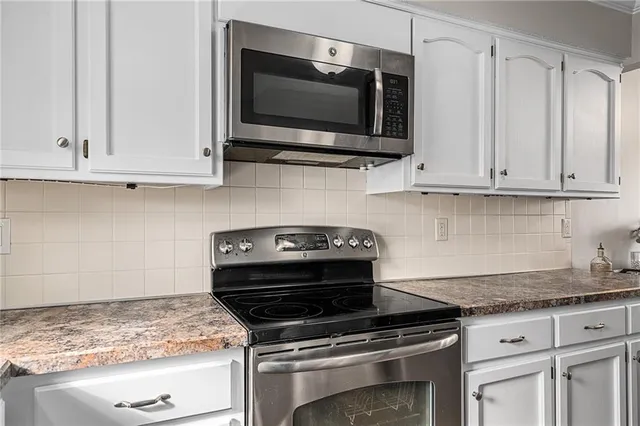 $310,000 | 2120 Southeast 3rd Street, Lee's Summit, MO 64063